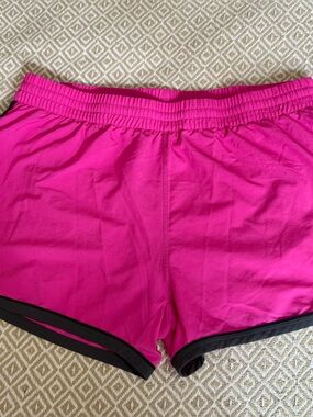 Women’s Under Armour Pink Athletic Shorts with Black Trim